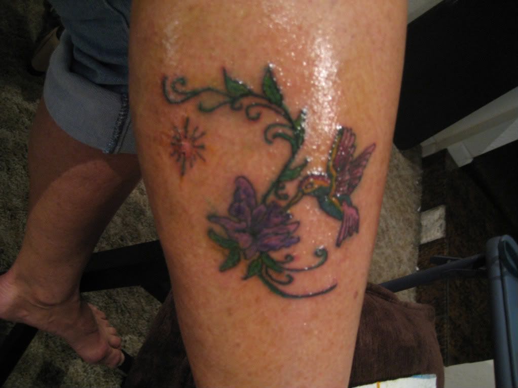 tattoos of hummingbirds and flowers. 60%. Hummingbird